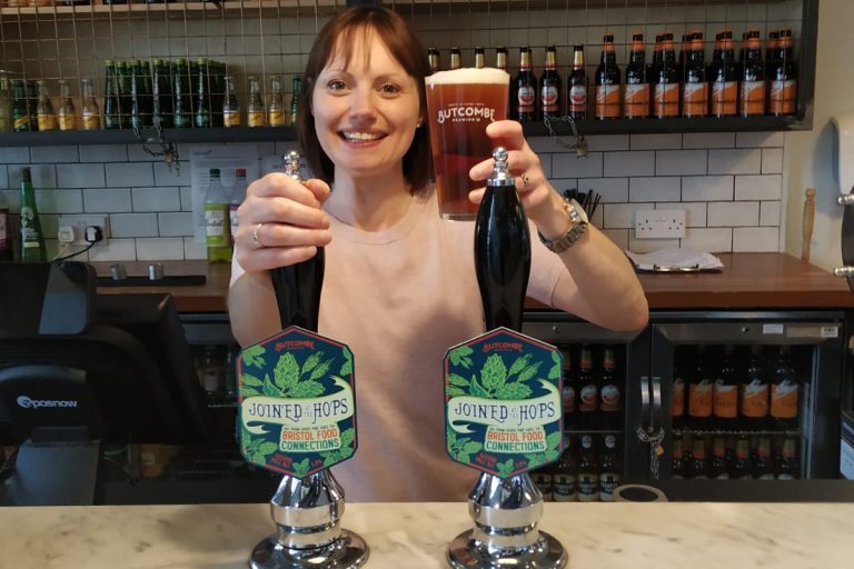 Rose Marsh pulls the first pint of Joined at the Hops, the Butcombe beer brewed specially for Bristol Food Connections 2019